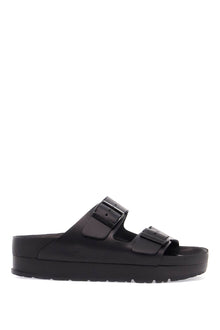  Birkenstock black leather platform sandals with two straps and metal buckles