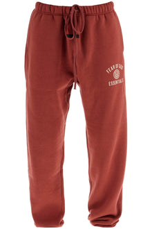  Fear Of God ESSENTIALS loose fit sweatpants in crimson red cotton