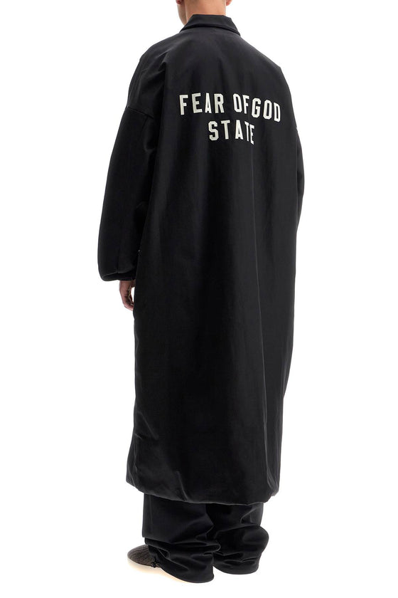 Fear Of God ESSENTIALS long nylon jacket with logo patch.