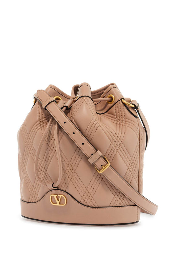 Valentino Garavani quilted pink leather bucket crossbody bag with golden details