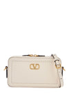 Valentino Garavani mini camera case in ivory leather with adjustable strap and golden details