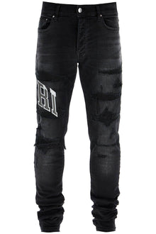  Amiri skinny jeans with varsity logo