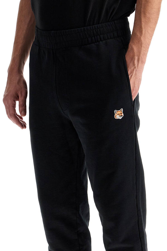 Maison Kitsune fox head joggers