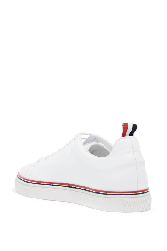 Thom Browne smooth leather sneakers with tricolor detail.