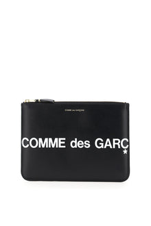  Comme Des Garcons Wallet leather pouch with logo