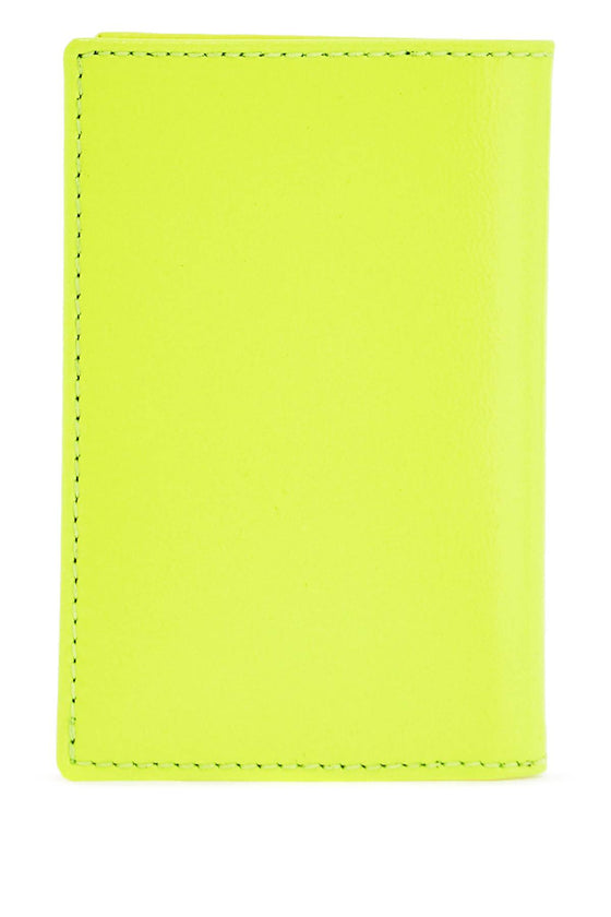 Comme Des Garcons Wallet compact wallet in fluorescent yellow goat leather