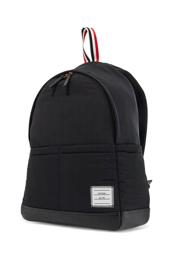 Thom Browne black multipocket backpack in polyester and leather with adjustable straps