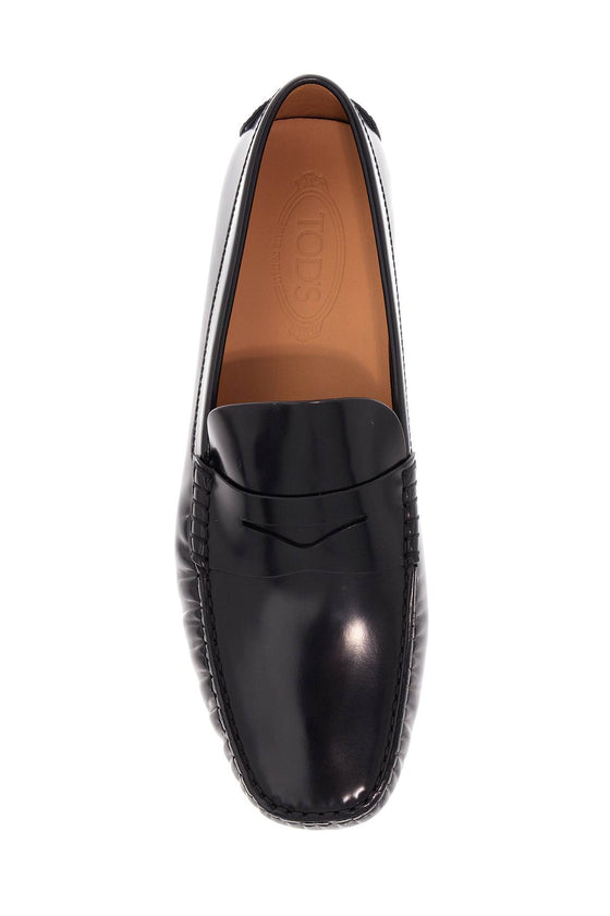 Tod'S men's black calfskin loafers with elegant insert and rubber sole